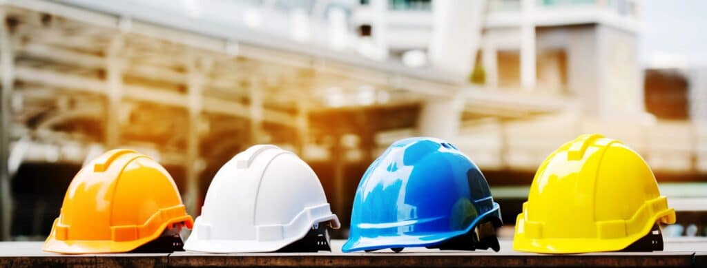 Hard hats being used for head protection in an industrial facility. 