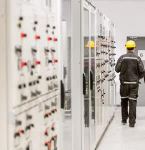 Technician performing preventative maintenance on his facility's switchgear. 