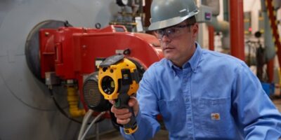 Man using Fluke tools for preventive maintenance