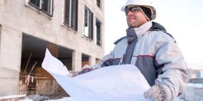 Man preparing for winter weather on the job site