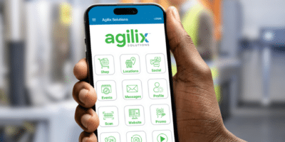 A closeup photo of a customer accessing the new Agilix Solutions online portal from a mobile phone.