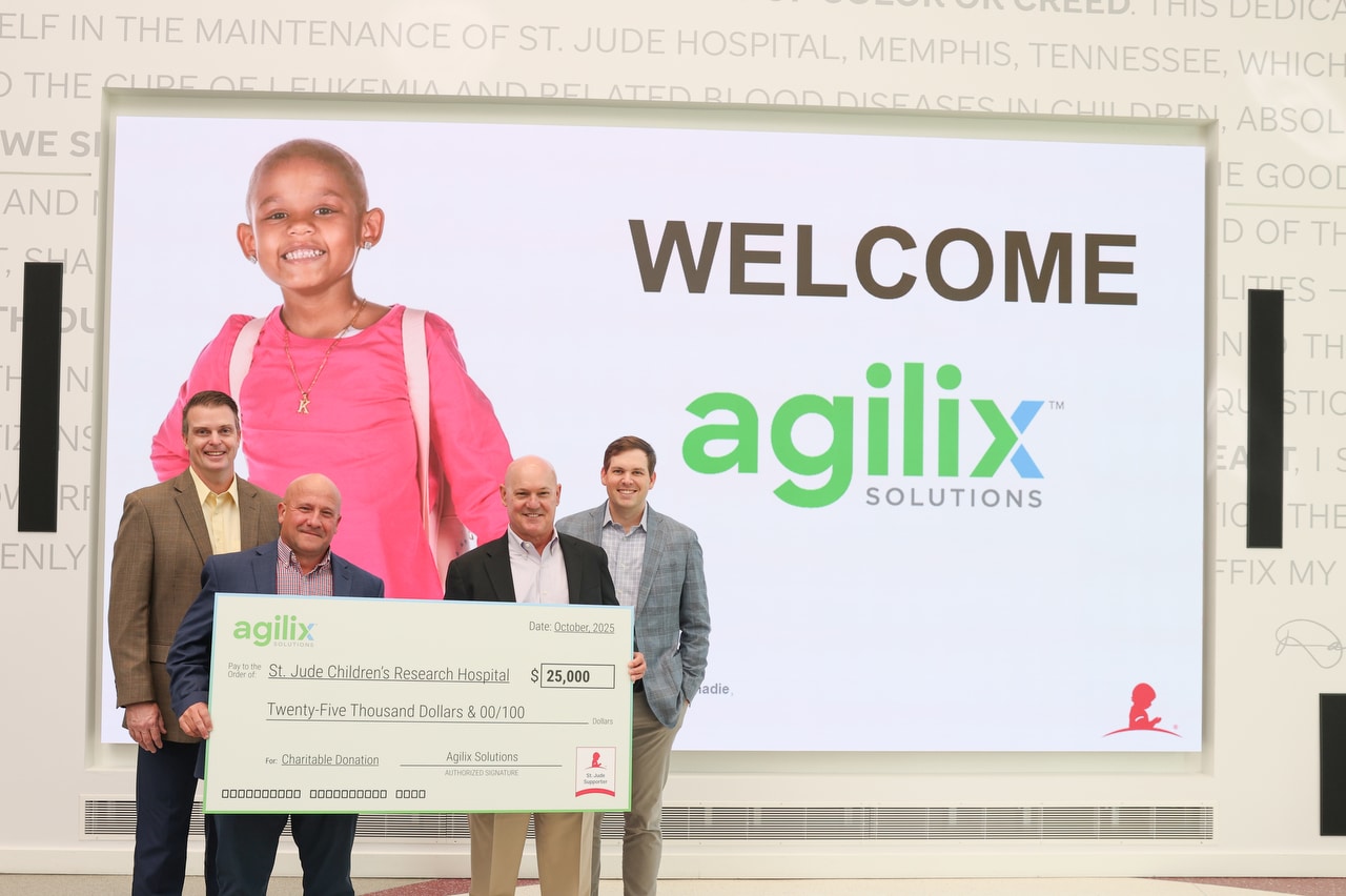 Agilix Solutions presenting check for donation to St. Jude.