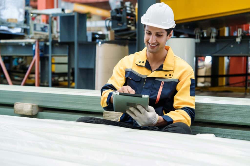 Man in factory accessing HOFFMAN DTM software.