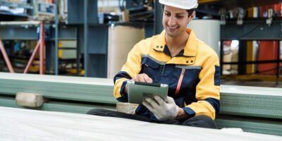 Man in factory accessing HOFFMAN DTM software.